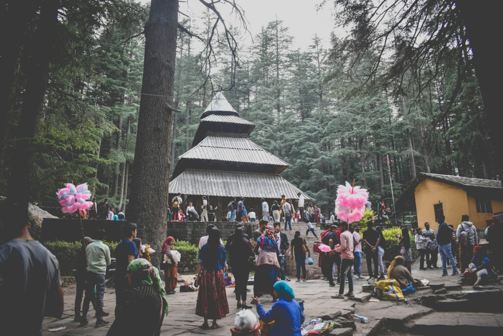 Tourists relaxing and enjoying in a beautiful park in Manali Himachal Pradesh