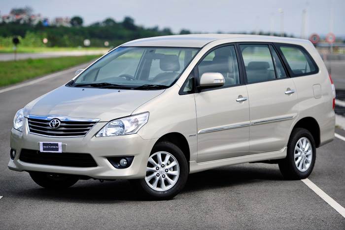 Toyota Innova taxi parked, ready for intercity travel service in Amritsar, Chandigarh, and New Delhi by VisitTaxi.