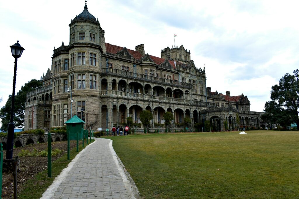 Wide panoramic landscape of Shimla with Viceroy Lodge